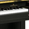 Piano acoustique droit C.BECHSTEIN 118 CLASSIC Noir Brillant Clavier d'un piano C. Bechstein noir.