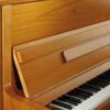 Piano acoustique droit C.BECHSTEIN 118 CONTUR Chêne Clair Piano droit en bois avec touches blanches et noires